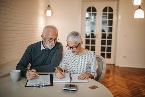 Senior couple looking over estate planning documents